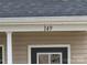 Close-up of the house number shows 