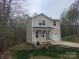 Charming two-story home featuring a covered porch and a convenient one-car garage at 149 Kodak Dr, Statesville, NC 28625