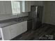 Well-lit kitchen features stainless steel appliances and white cabinetry at 149 Kodak Dr, Statesville, NC 28625