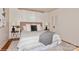 This bedroom boasts a cozy decor with a plush rug, comfortable bed, and stylish side tables with lamps at 1501 Briarfield Dr, Charlotte, NC 28205