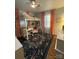 Charming bedroom with a loft bed and study area, illuminated by natural light at 1501 Briarfield Dr, Charlotte, NC 28205