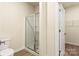 Bathroom showcasing a glass-enclosed shower and a glimpse into the walk-in closet at 1550 Doran Ter, Richburg, SC 29729