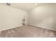 An empty bedroom with natural light, neutral paint, and plush carpeting at 1550 Doran Ter, Richburg, SC 29729