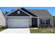 Charming single-Gathering home with a two-car garage and well-maintained lawn in a suburban neighborhood at 1550 Doran Ter, Richburg, SC 29729