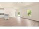 Bright living room with access to a sliding glass door to backyard, white trim, and neutral paint at 1550 Doran Ter, Richburg, SC 29729