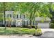 Inviting home features manicured lawn, traditional architecture, and a two-car garage at 16614 Beech Hill Dr, Huntersville, NC 28078