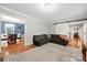 Comfortable living room with hardwood floors, sliding barn door, and open layout at 16614 Beech Hill Dr, Huntersville, NC 28078