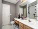 Full bathroom with vanity and sink, white tile floors and an enclosed shower at 1766 Forest Side Ln, Charlotte, NC 28213