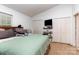 Cozy bedroom with vaulted ceiling, plush carpet, large bed and a triple closet at 1766 Forest Side Ln, Charlotte, NC 28213