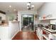 Bright dining area with hardwood floors and access to outdoor patio at 1766 Forest Side Ln, Charlotte, NC 28213