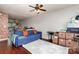 Bright living room with hardwood floors and a ceiling fan at 1766 Forest Side Ln, Charlotte, NC 28213