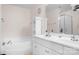 Elegant bathroom with a large tub, double vanity, and sleek fixtures for a spa-like experience at 1849 Meadow Crossing Dr # 118, Huntersville, NC 28078