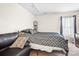 Relaxing bedroom with a plush bed, soft lighting, and a soothing color palette at 1849 Meadow Crossing Dr # 118, Huntersville, NC 28078