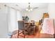 Cozy dining area with a table and chairs, with good light at 1849 Meadow Crossing Dr # 118, Huntersville, NC 28078