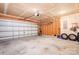 Spacious two-car garage with overhead lighting and ample storage space for vehicles and tools at 1849 Meadow Crossing Dr # 118, Huntersville, NC 28078
