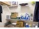 A walk-in closet with ample storage, shelves, and rods for an organized wardrobe at 1849 Meadow Crossing Dr # 118, Huntersville, NC 28078