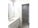 Bright and clean bathroom with tub/shower combo and white vanity at 19044 Newburg Hill Rd, Davidson, NC 28036