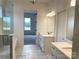 Elegant bathroom with double vanity, modern fixtures, and a separate shower at 19044 Newburg Hill Rd, Davidson, NC 28036