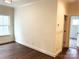 Bright bedroom with hardwood floors, large window, and neutral paint at 19044 Newburg Hill Rd, Davidson, NC 28036
