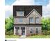Charming two-story home with a brick foundation, gray siding, and a welcoming covered front porch at 19044 Newburg Hill Rd, Davidson, NC 28036