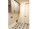 Convenient laundry room with cabinetry, a patterned floor, and washer/dryer hookups at 19044 Newburg Hill Rd, Davidson, NC 28036