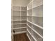 Organized walk-in pantry with ample shelving and storage space at 19044 Newburg Hill Rd, Davidson, NC 28036