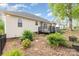 The backyard features an inviting deck, lush landscaping, and a well-maintained lawn at 2068 Samantha Dr, Kannapolis, NC 28083