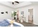 Bright main bedroom boasts neutral decor, large windows, and access to a walk-in closet and ensuite bathroom at 2068 Samantha Dr, Kannapolis, NC 28083