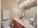 Bright bathroom with a vanity, toilet, and good natural lighting at 215 6Th St, Belmont, NC 28012