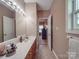 Bathroom with a vanity, neutral color scheme, and good natural lighting at 215 6Th St, Belmont, NC 28012