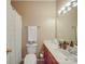 Bright bathroom featuring a vanity, toilet, and a shower tub at 215 6Th St, Belmont, NC 28012