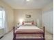 Cozy bedroom featuring a queen-sized bed, large windows, and a ceiling fan at 215 6Th St, Belmont, NC 28012