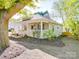 Single-story home with a inviting front porch, manicured landscaping, and neutral exterior paint at 215 6Th St, Belmont, NC 28012
