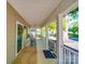 Spacious covered porch featuring rocking chairs and a porch swing, perfect for relaxing at 215 6Th St, Belmont, NC 28012