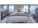 Relaxing main bedroom with neutral tones, comfortable bedding, and natural light at 215 6Th St, Belmont, NC 28012