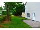 Private backyard featuring a concrete patio, convenient shed, and lush greenery, ideal for relaxation and outdoor activities at 2624 St Helena Ct, Fort Mill, SC 29715