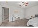 Clean, neutral bedroom with carpet, ceiling fan, and desk area at 2624 St Helena Ct, Fort Mill, SC 29715
