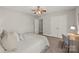 Bright bedroom with closet, carpet, desk, and ceiling fan at 2624 St Helena Ct, Fort Mill, SC 29715