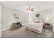 Tastefully decorated bedroom with carpet, neutral walls, and lamps at 2624 St Helena Ct, Fort Mill, SC 29715