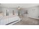 Spacious primary bedroom features neutral walls, carpet, and an ensuite bathroom at 2624 St Helena Ct, Fort Mill, SC 29715