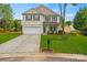 Inviting two-story home with a well-maintained lawn and attached two-car garage at 2624 St Helena Ct, Fort Mill, SC 29715