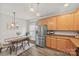 Open concept kitchen with stainless steel refrigerator and inviting breakfast nook at 2624 St Helena Ct, Fort Mill, SC 29715