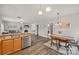 Open-concept with dining, kitchen and fireplace at 2624 St Helena Ct, Fort Mill, SC 29715