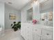 A double vanity and marble floors offer a sleek design to this bathroom at 281 Loch Stone St, Fort Mill, SC 29715