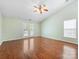 Spacious bedroom with french doors leading to a deck, a ceiling fan and great natural light at 3022 Willamette Valley Dr, Charlotte, NC 28215