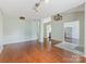 A large living area features dark wood floors and an open floorplan at 3022 Willamette Valley Dr, Charlotte, NC 28215
