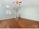 Wood floors enhance an open floorplan living area at 3022 Willamette Valley Dr, Charlotte, NC 28215