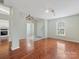 Comfortable living room with wood floors opens to kitchen at 3022 Willamette Valley Dr, Charlotte, NC 28215