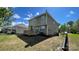 Exterior of the back of the house showing a small deck and well maintained yard at 3030 Collin House Dr, Fort Mill, SC 29715