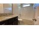 Clean bathroom featuring a tub and shower combo, single sink with granite counter top, and a large mirror at 3030 Collin House Dr, Fort Mill, SC 29715